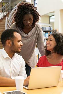 Parents and teachers discussing progress